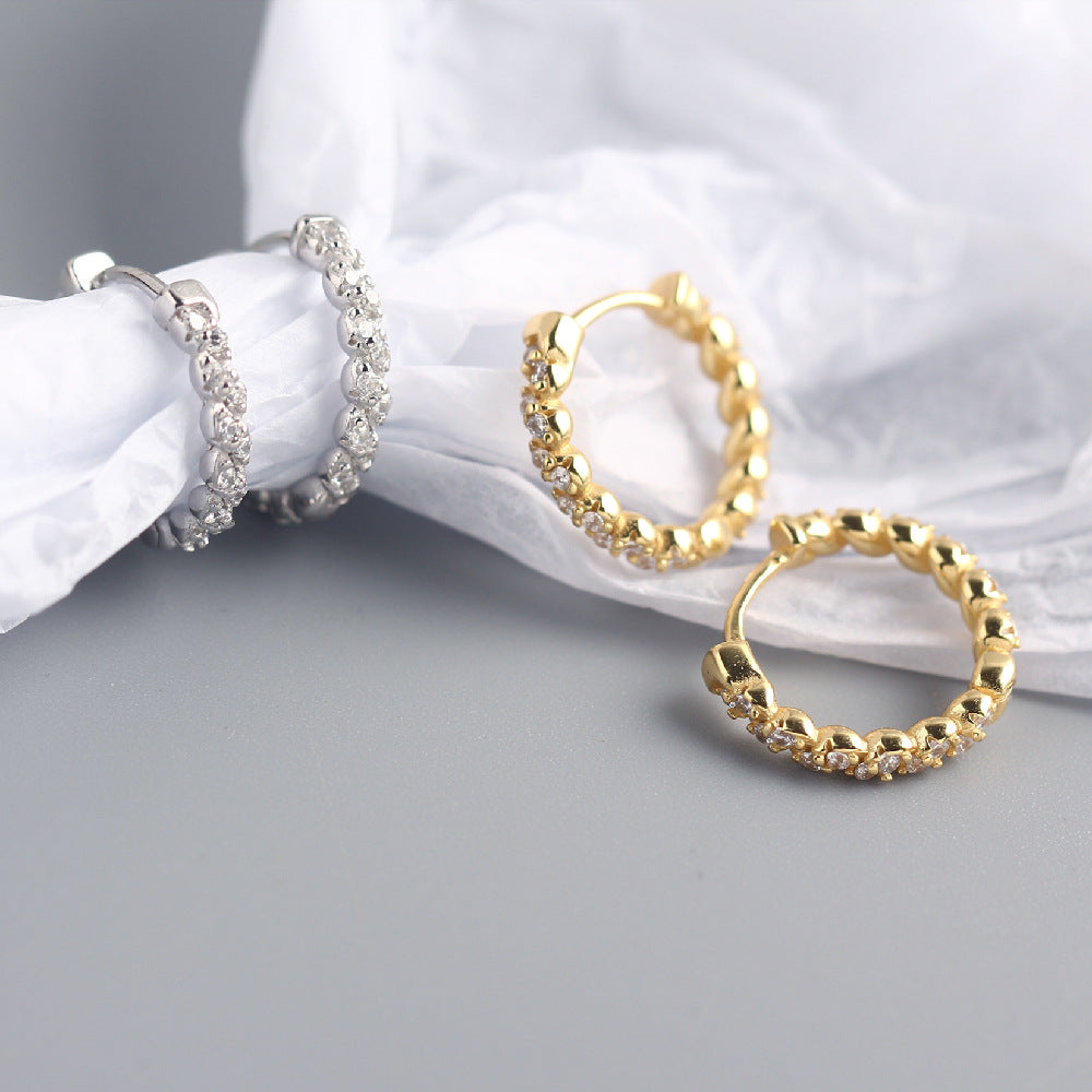 Twist Zircon Hoops